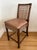 Beautifully crafted vintage counter stool featuring a open woven leather lattice strap design on seat and back rest....