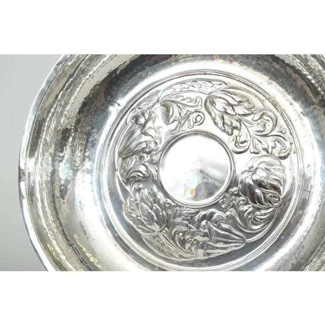 Antique pair of silver over copper bowls hand crafted during the Arts & Crafts movement. The repoussé pattern is of...