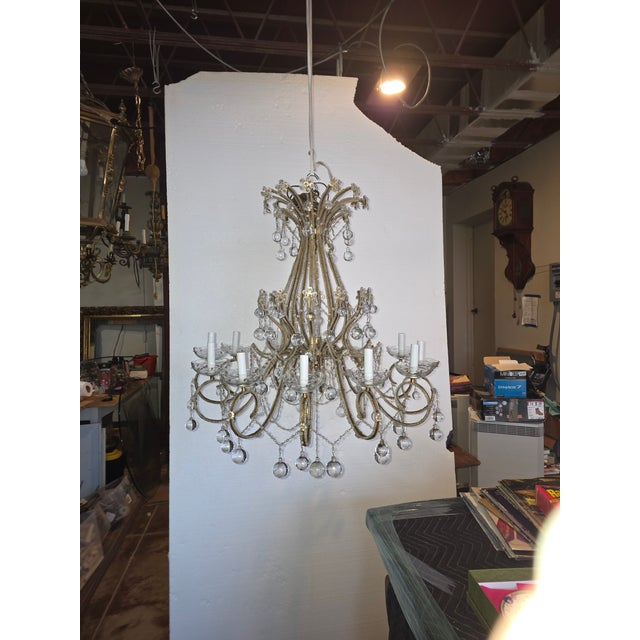 Great looking beaded arms and murano glass drops, 12 lights .