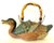 Charming Asian teapot in the style of a duck swimming through the reeds and iris. Lovely detail down to its webbed feet....
