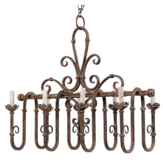 French Vintage 8-Light Iron Chandelier With Pleasingly Swagged & Scrolled Design For Sale