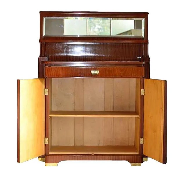 Elegant original Art Nouveau vertico, narrow Solid wood, mahogany veneer Veneer with beautiful grain Expertly restored...