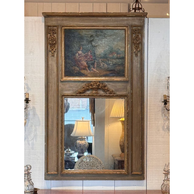 A French trumeau labeled “French Trumeau 19th,” constructed with an upper painted panel depicting a figural pastoral scene...