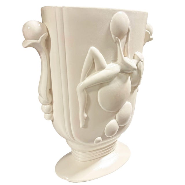 This stunning Art Deco vase, model #4600 by Pacific Pottery, features a striking high-relief "Bubble Girl" design. The...