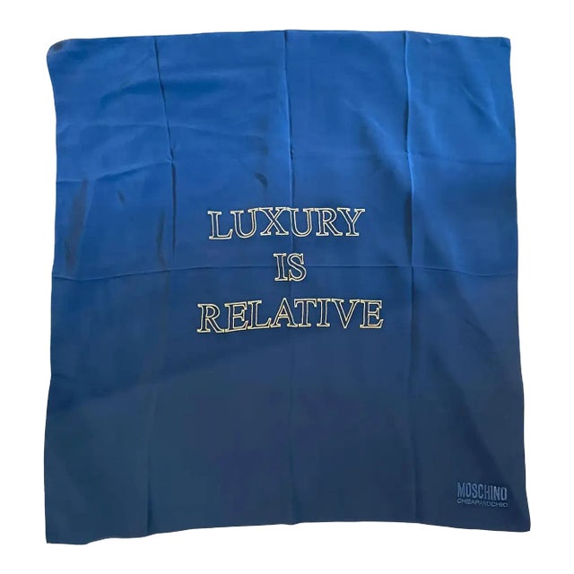 1980s Vintage Luxury Is Relative Blue and Gold Silk Italian Foulard by Moschino For Sale