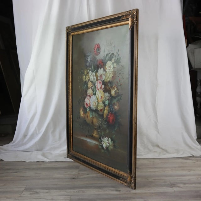 A breathtaking antique-style floral oil painting featuring a dramatic bouquet of roses, peonies, and lilies in an ornate...
