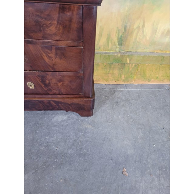 Small Louis Philippe period mahogany commode with a marble top. What a lovely piece, with its unusual proportions. The top...