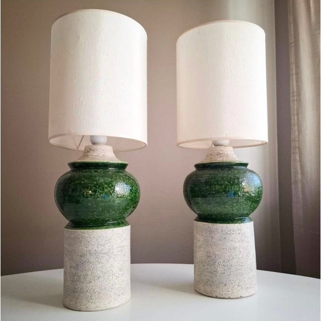 A striking pair of monumental ceramic table lamps designed by Aldo Londi, manufactured by Bitossi Ceramiche in Montelupo...