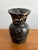Lovely and heavy for its diminutive size, this 1970s bud vase sculpture is cut from veined black marble. Marked on bottom...