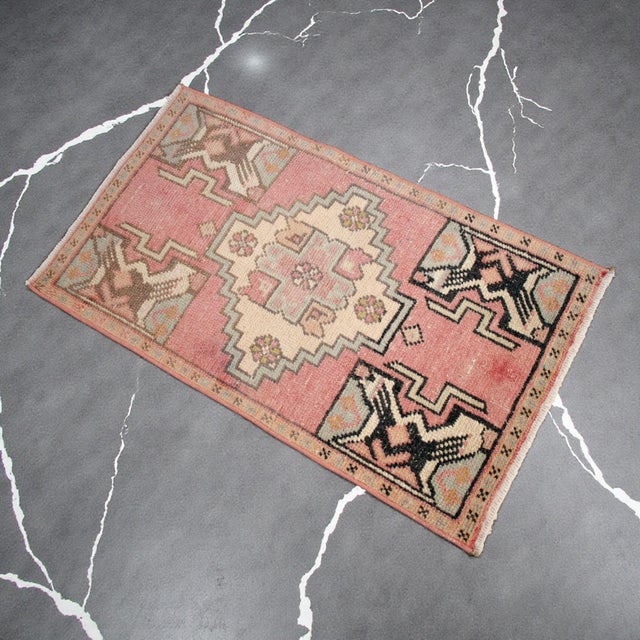 Vintage Turkish Hand-Knotted Small Rug from Nevsehir, 1970, featuring warm dusty rose tones and authentic village...