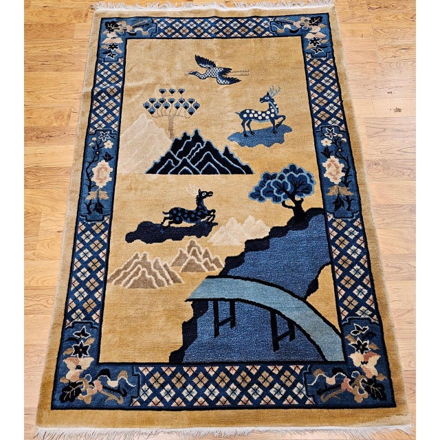 Timeless elegance meets storytelling artistry in this Vintage Chinese Art Deco rug, hand-knotted in the early 1900s. A...