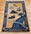 Timeless elegance meets storytelling artistry in this Vintage Chinese Art Deco rug, hand-knotted in the early 1900s. A...
