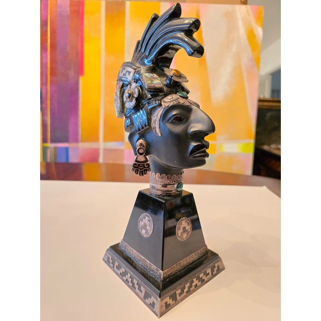 A very fine black onyx glass silver mounted bust sculpture. Having exquisite jeweled adornments such as Tigers eye...