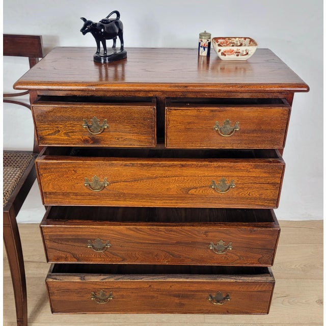 This is a gorgeous mid 20th century chest of drawers, displaying a rich mahogany patination that is sure to impress in a...