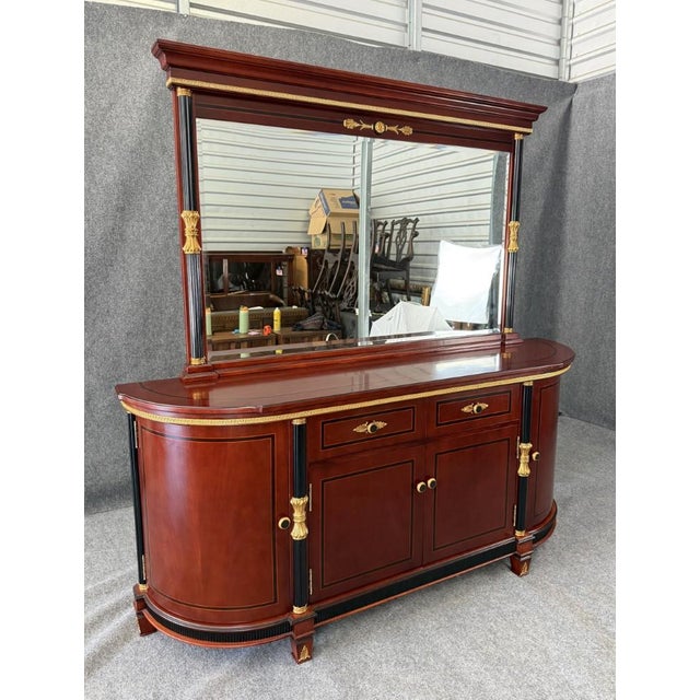 This Astoria Grand Gigasso 83″ Sideboard Buffet with Mirror makes a grand formal dining-room statement with rich walnut-...