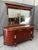 This Astoria Grand Gigasso 83″ Sideboard Buffet with Mirror makes a grand formal dining-room statement with rich walnut-...