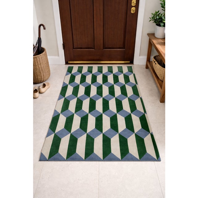 This beautiful hand-tufted rug is expertly crafted by skilled artisans using high-quality Newzealand wool for a soft yet...