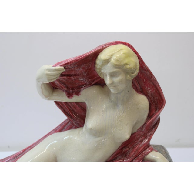 C. 20th Century This Magnificent Female nude sculpture holds no bounds, Calmly sitting with birds while slightly covering...