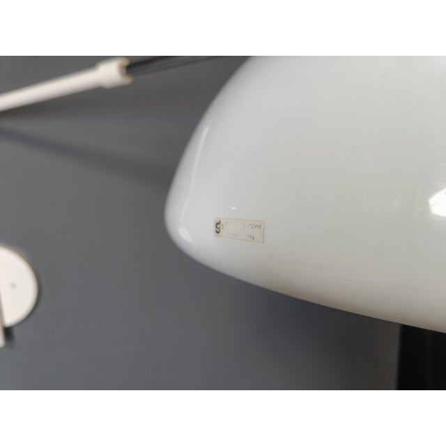 Vintage Wall Lamp by Luigi Massoni for Guzzini, 1970s, in Very Good conditions. Designed 1970 to 1979 This piece has an...