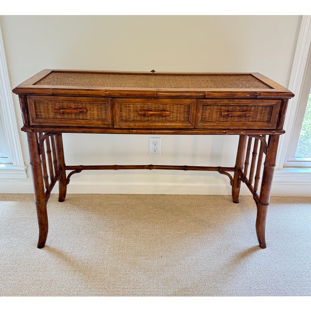 Rare Find. Vintage American of Martinsville bamboo and rattan vanity desk featuring original arched adjustable mirror....