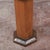 An elegant Art Deco-era pedestal column, dating from the 1930s, characterized by a clean, geometric hexagonal design. This...