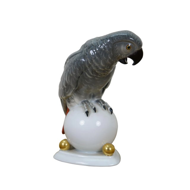 Antique Art Deco 1925 Hutschenreuther porcelain figurine in the shape of an African Gray Parrot perched on a white orb...