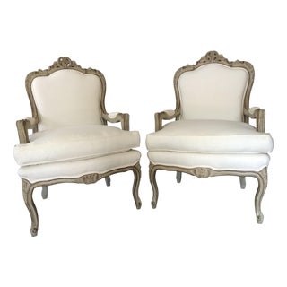 A Pair of Mid 18th Century Louis XV-style Upholstered Bergere Armchairs With Rococo Influence For Sale