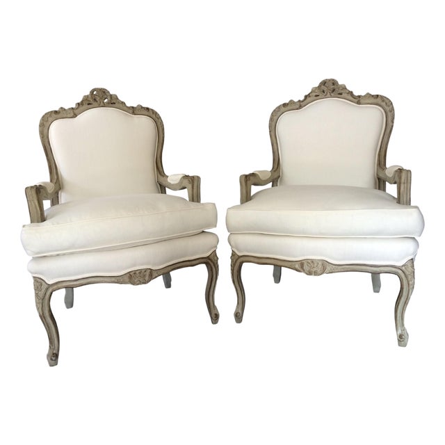 A Pair of Mid 18th Century Louis XV-style Upholstered Bergere Armchairs With Rococo Influence For Sale