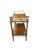 This pre-loved wood bar cart brings classic charm and effortless function to any entertaining space. Designed with two...