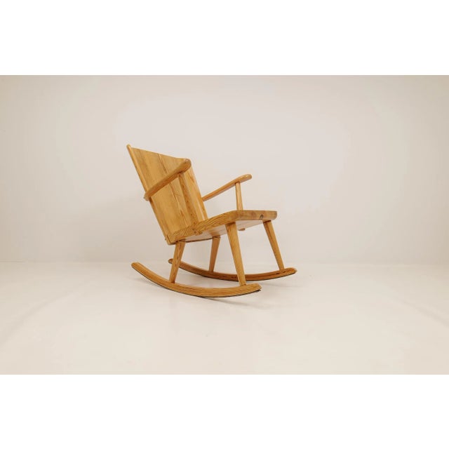 Rocking chair, made in solid pine, designed by göran malmvall for svensk fur, sweden. Modernist design in traditional...