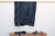 A masterwork of Malian textile heritage featuring deep indigo saturation and symbolic geometric motifs. Originating from...