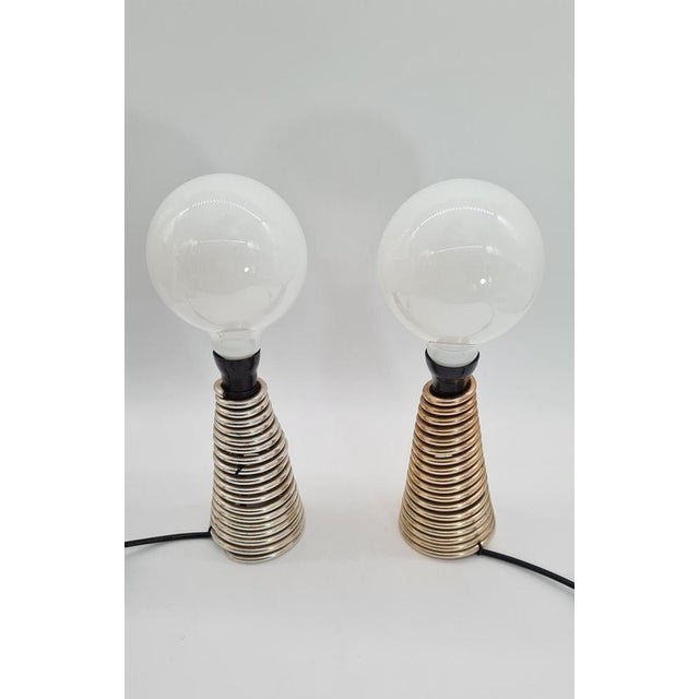 An original pair of vintage/modernist table lamps, manufactured in Czechoslovakia. A distinctive, sculptural design based...