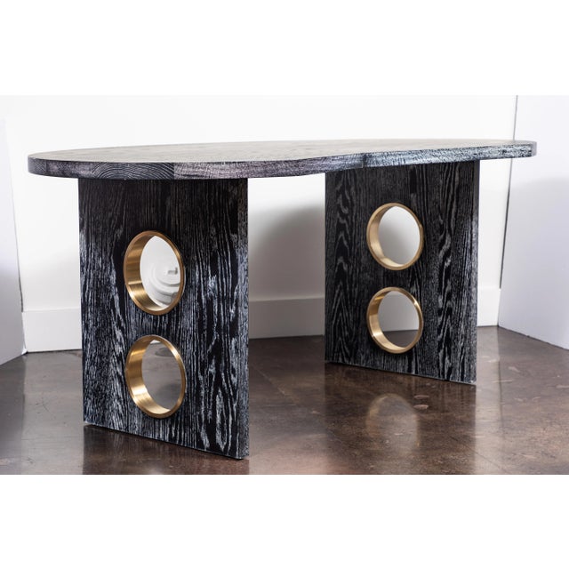 Glamorous desk in cerused oak with brass porthole details on the legs by On Madison. To order, 8-10 weeks. Custom ceruse...