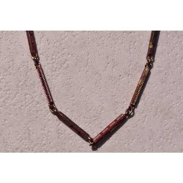 The 84th Street: Antique Art Deco Era Purple Toned Yellow Gold Bracelet. This original art deco bracelet features a square...