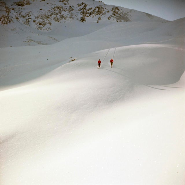 Mountain Top by Toni Frissell Skiers descending high in the mountains, Klosters, Switzwerland, 1951. (Photo by Toni...
