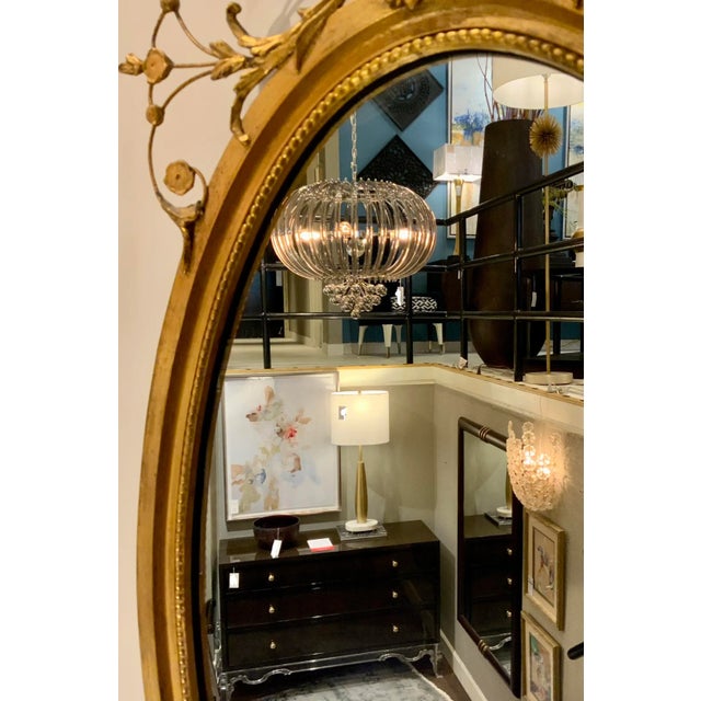 1990s Vintage Decorative Arts Oval Carved Gold New York Wall Mirror For Sale - Image 5 of 7