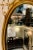 1990s Vintage Decorative Arts Oval Carved Gold New York Wall Mirror For Sale - Image 5 of 7