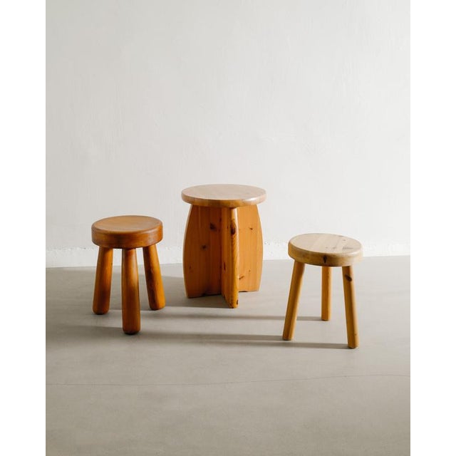 Rare set of three vintage Swedish mid century wooden stools in pine produced in Sweden, 1970s In good original condition...