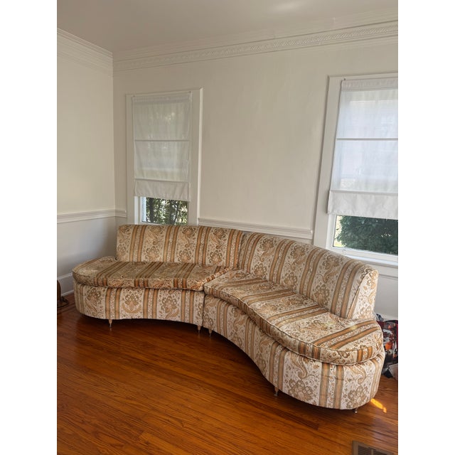 Gorgeous curved 1960’s 2 sectional sofa. Original velvet fabric and a very pretty pattern and color palette. Comfortable...