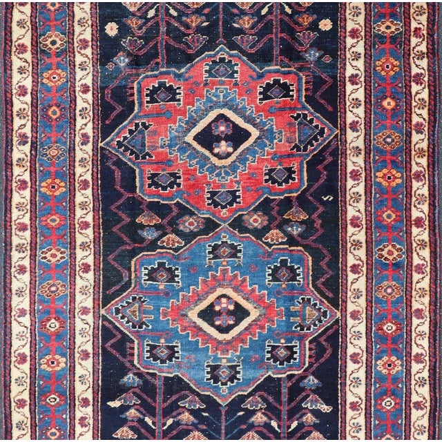 Antique Persian Kurdish Tribal Rug in Sub-Geometric Medallion Design. Country of origin: Iran; Type: Kurdish; Design:...