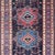 Antique Persian Kurdish Tribal Rug in Sub-Geometric Medallion Design. Country of origin: Iran; Type: Kurdish; Design:...