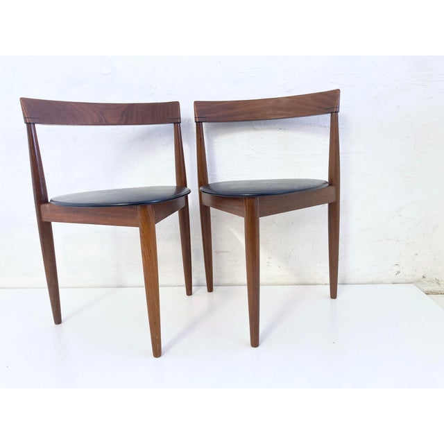 Two side chairs by Frem Rojle, Denmark, from the Roundette seating group, designed by Hans Olsen for Frem Rojle. Teak,...