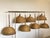 Set of 7 wicker and bamboo chandeliers 70s. Up to 250V (Europe/UK Standard).The wiring of this item may be original and...