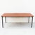 A newly refinished South African mid-century modern dining table in sapele mahogany and welded steel, made by D.S. Vorster...