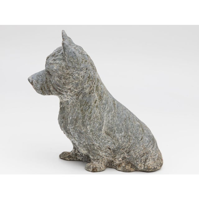 A Scottish Terrier Cast Iron or Spelter Figure, compact and self assured, mirrors early 20th century tastes for animal...