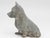 A Scottish Terrier Cast Iron or Spelter Figure, compact and self assured, mirrors early 20th century tastes for animal...