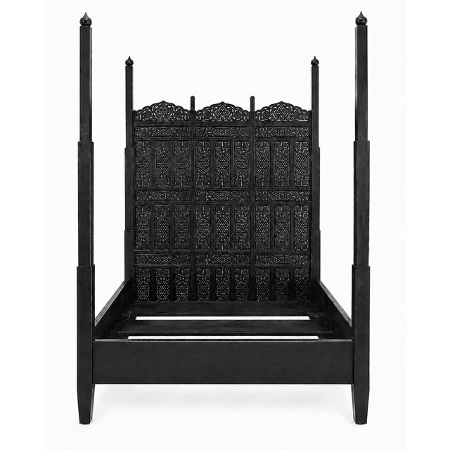 An impressive hand-carved Indo-Portuguese style queen four-poster bed, handcrafted in India circa 2000 and finished in a...