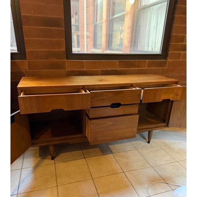 Vintage Kroehler Custom Crafter Walnut Credenza, Circa 1960s A well-proportioned mid-century modern credenza by Kroehler’s...