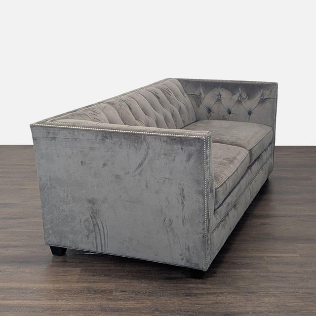 This stylish sleeper sofa by Mitchell Gold + Bob Williams features a plush gray velvet finish, elegant tufted backrest,...
