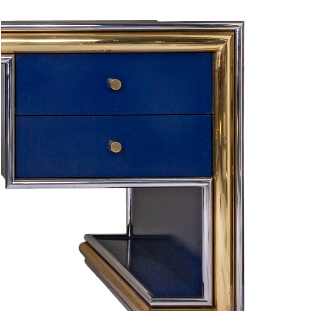 This beautiful french cobalt blue, mid-century modern brass and chrome desk. The top is rich blue with chrome and brass...